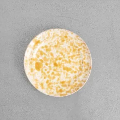 244 FASANO Assiette en faïence tachetée - Ambre